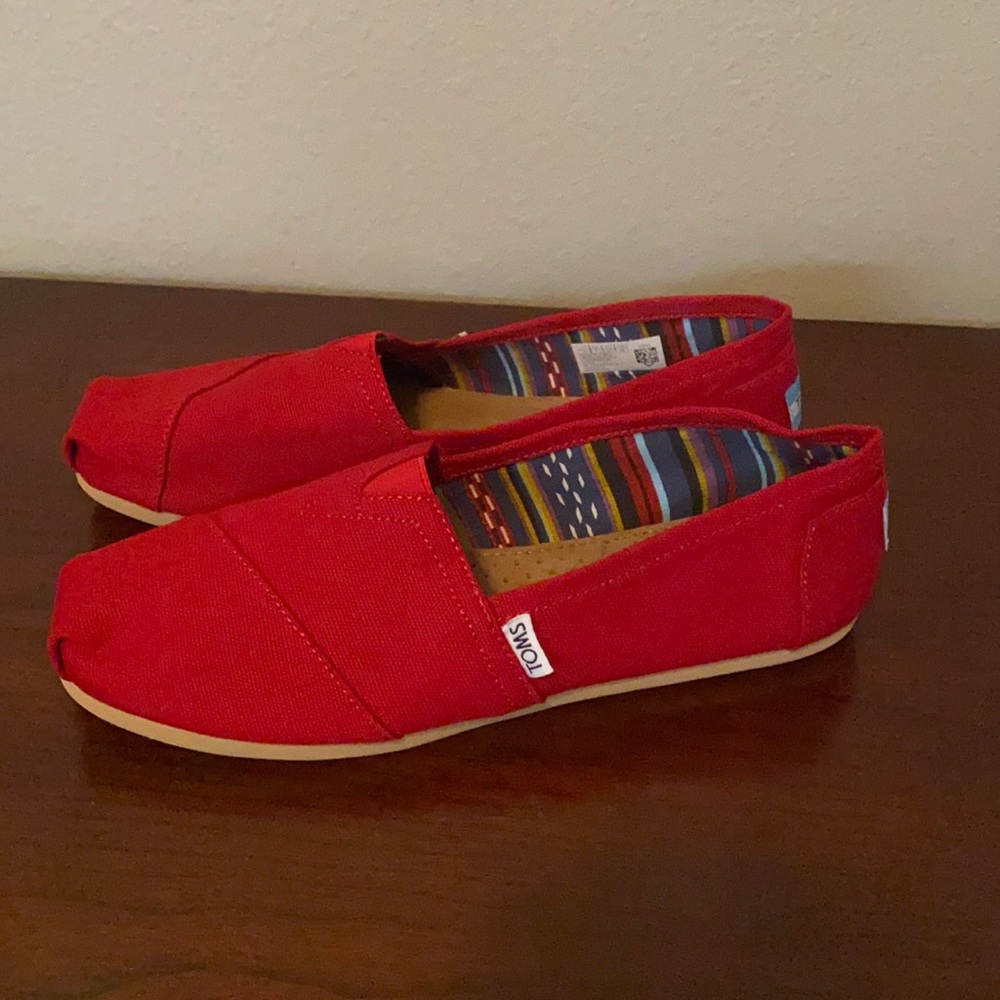 Brand new red Toms shoes